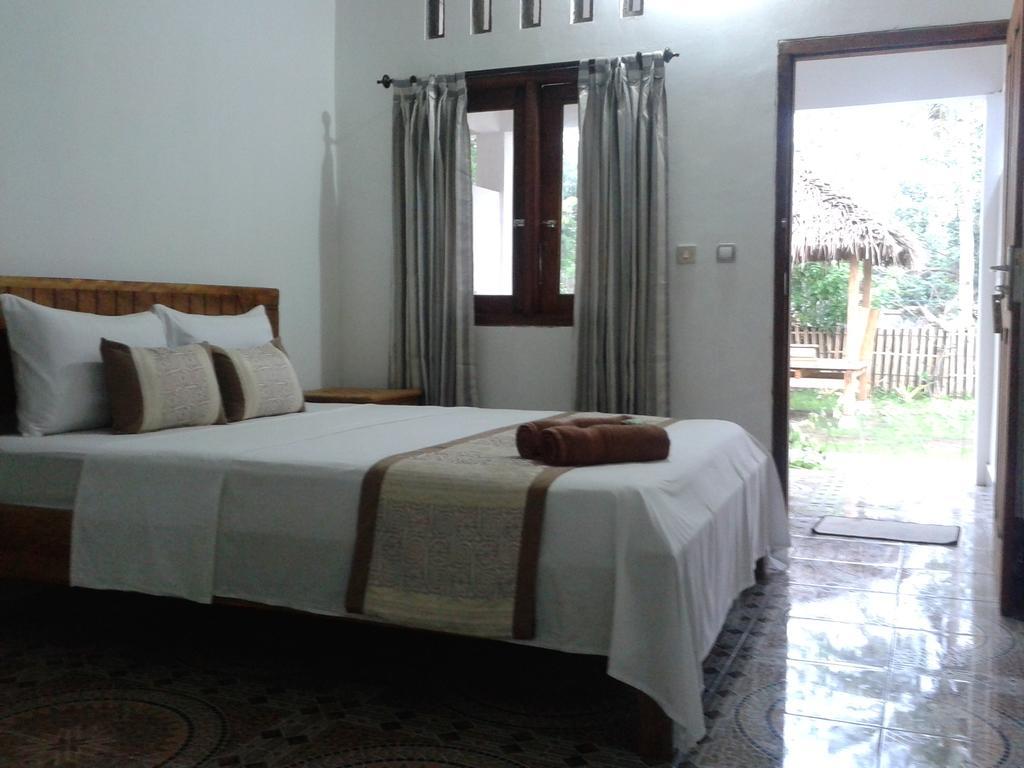 Putri Homestay กิลิเมโน ห้อง รูปภาพ