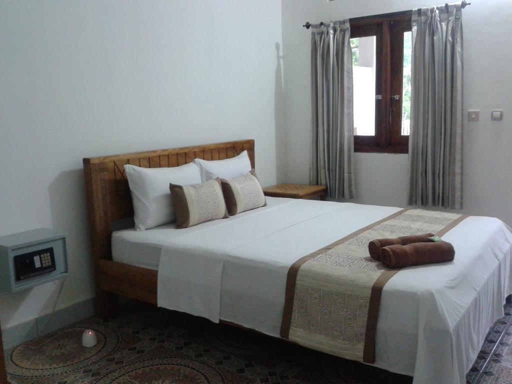 Putri Homestay กิลิเมโน ห้อง รูปภาพ