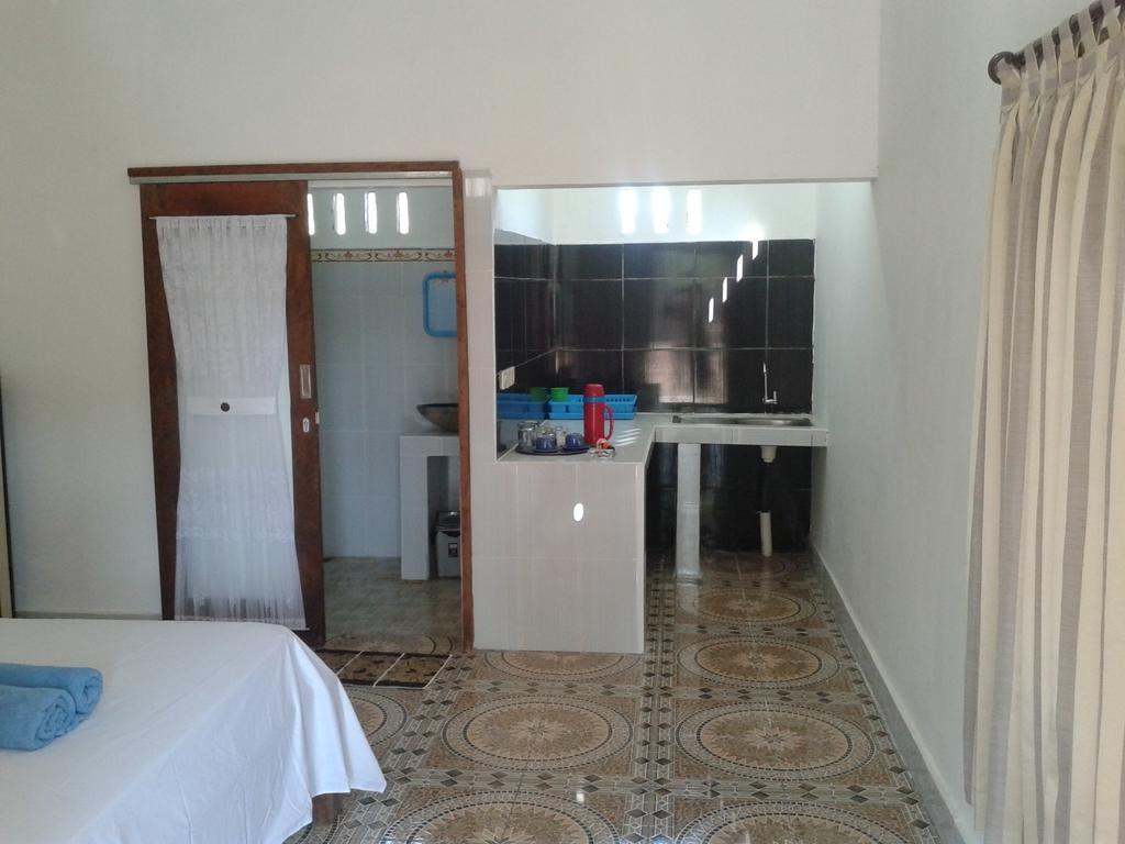 Putri Homestay กิลิเมโน ห้อง รูปภาพ