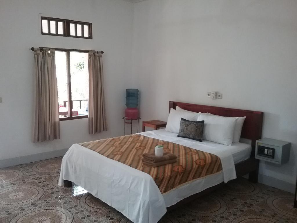 Putri Homestay กิลิเมโน ภายนอก รูปภาพ