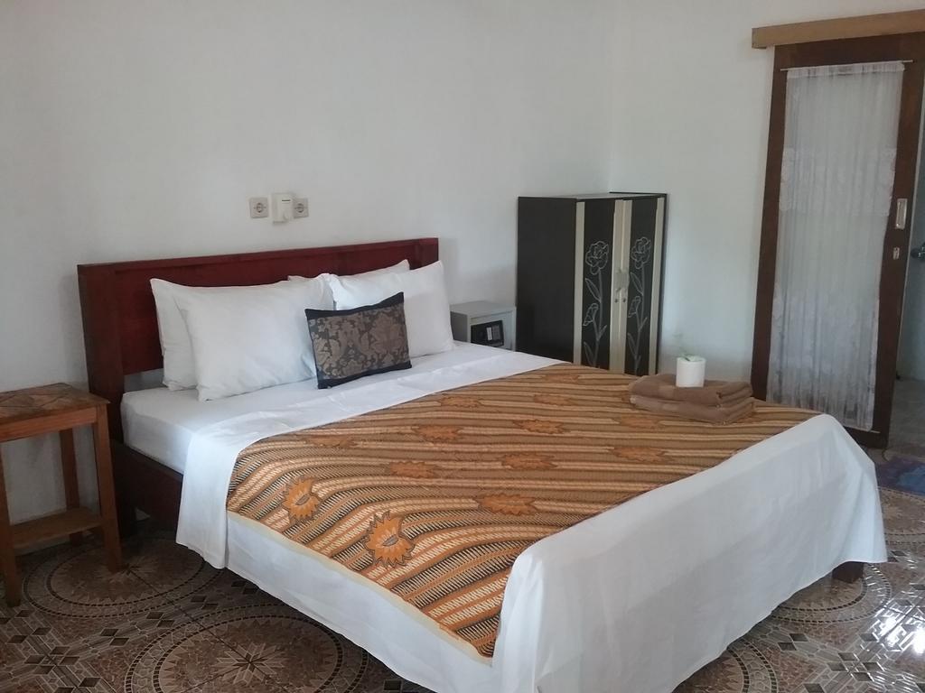 Putri Homestay กิลิเมโน ภายนอก รูปภาพ